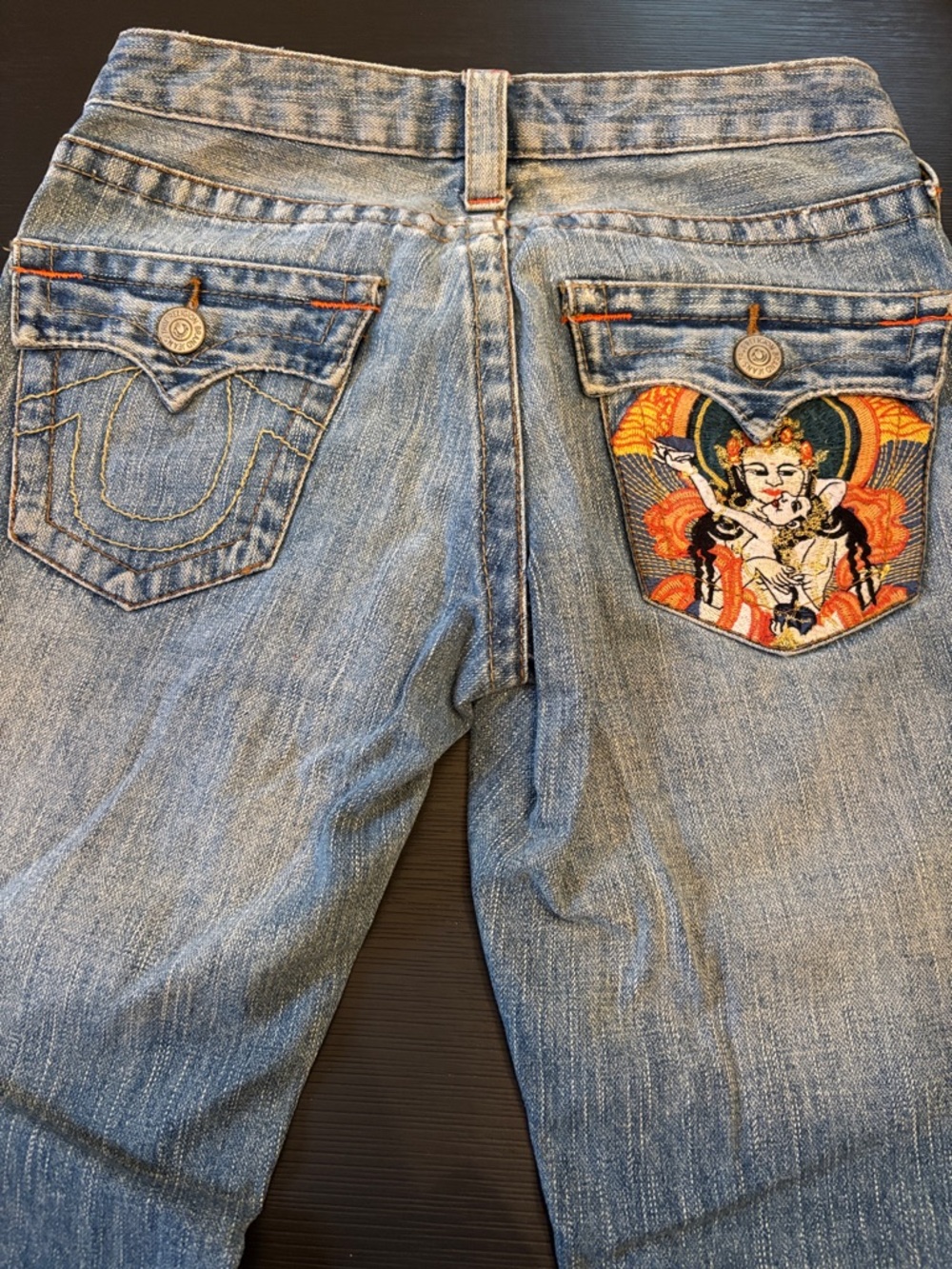 True Religion Light Blue Relaxed Jeans with Embroidered Back-Pocket Art